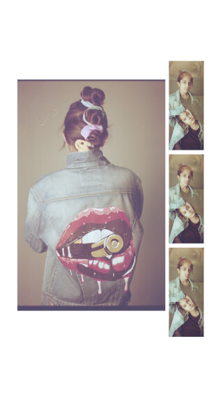 A woman in a denim jacket with painted lips and a bullet on the back, vintage style, fun concept.