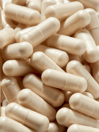 Close up image of capsules, ideal for medicine, healthcare, or wellness concepts.