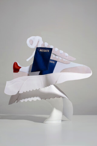 Stylish Axel Arigato sneaker stands out with its modern design and minimalist aesthetic.